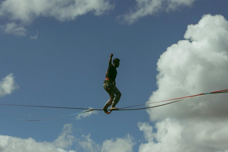 a man walking on the rope